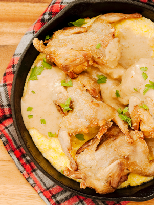 Pan Fried Quail with Grits and Onion Gravy Thumbnail